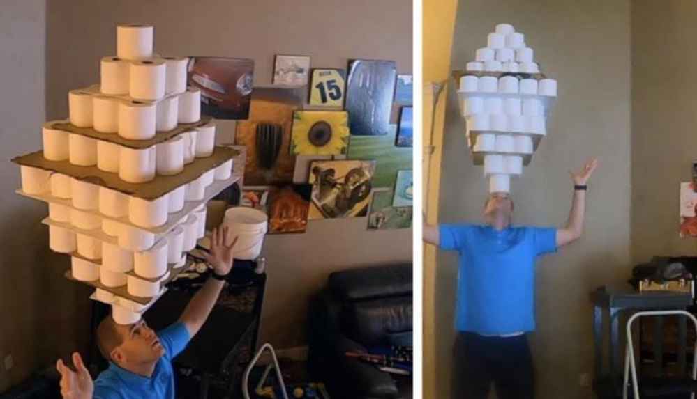 Kafasında 101 tuvalet kağıdı rulosu taşıdı_ Guinness Rekorlar Kitabı'na girdi